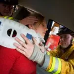 Injured woman in a car