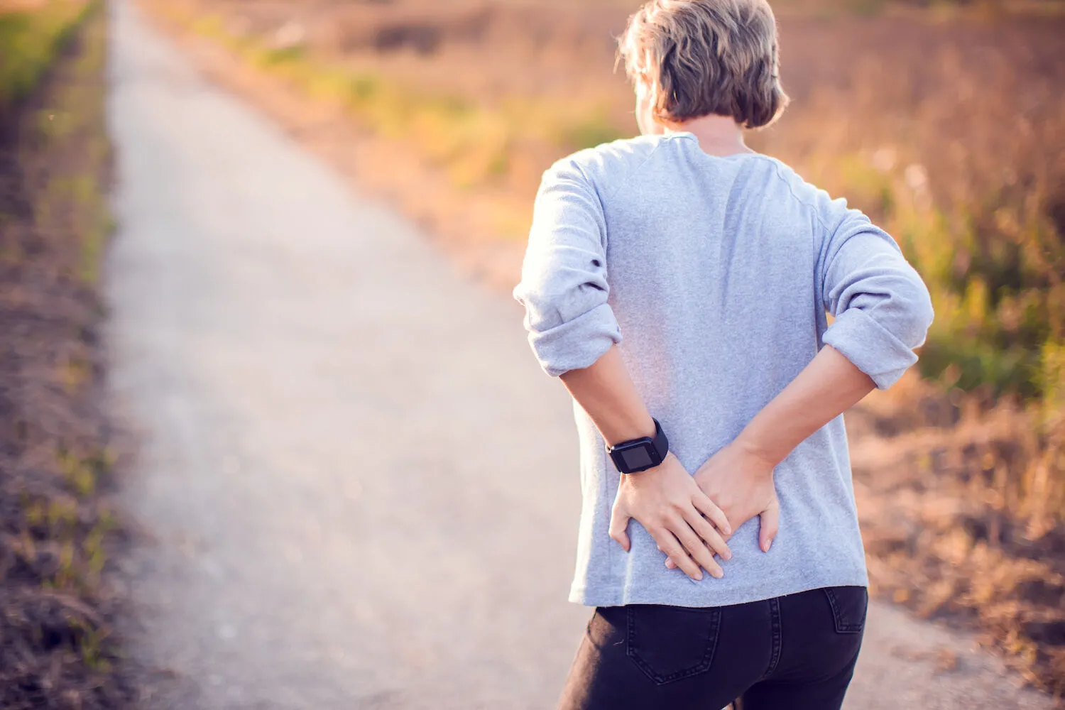 old woman having a hip pain after waking
