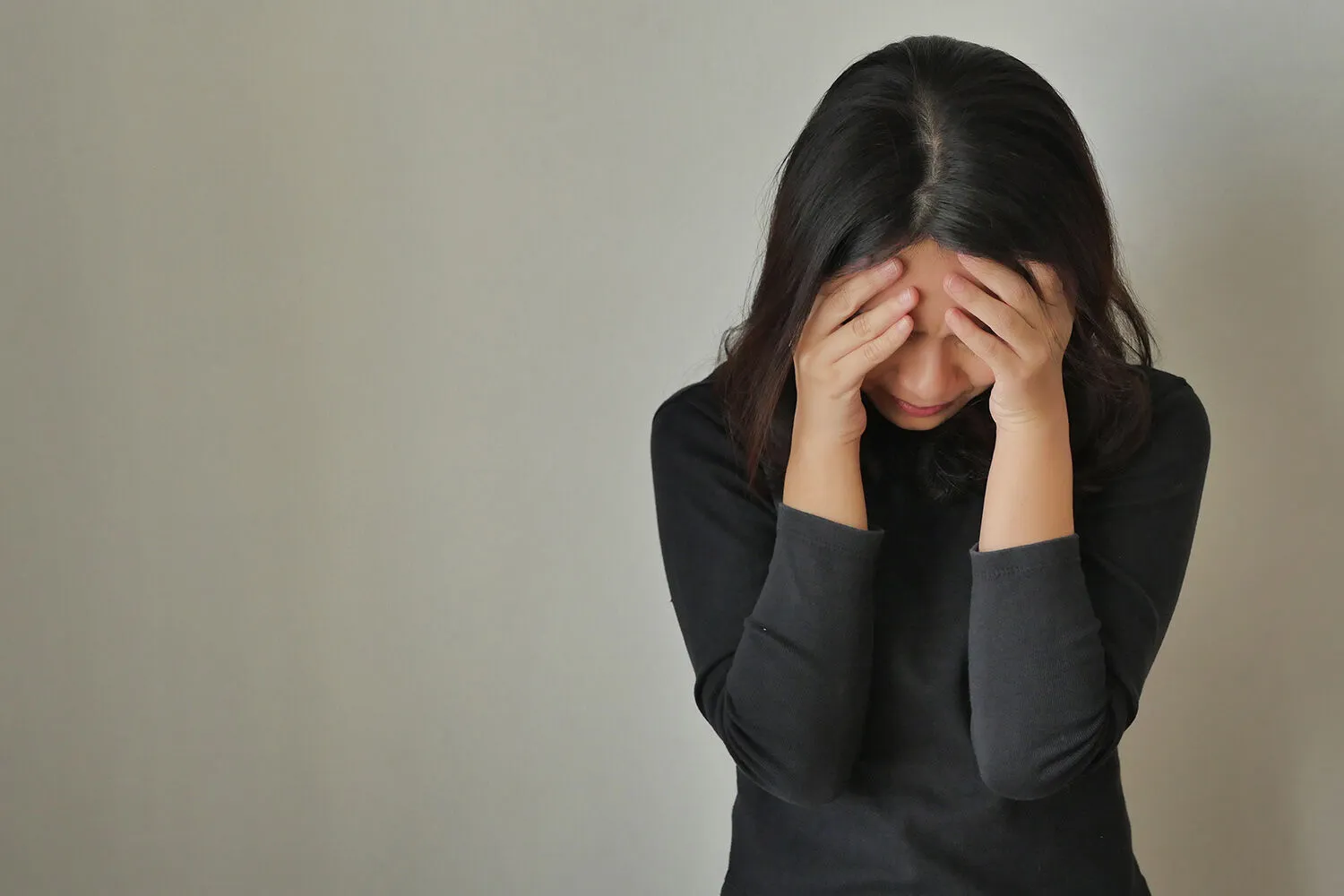 woman suffering from vertigo